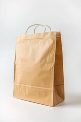 Poster - Simple brown paper bag on a white background. Ideal for packaging or recycling concepts