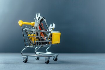 Fototapete - A shopping cart filled with tools on top of a table. Ideal for home improvement projects