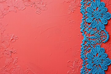 Poster - Close up of blue lace on red background. Perfect for fashion design projects