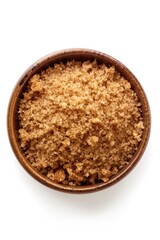 A wooden bowl filled with brown sugar. Perfect for food blogs or recipes