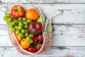 Poster - Fresh fruit in a mesh bag on a rustic wooden table, perfect for healthy eating concepts