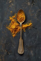 Aufkleber - A spoon and pile of turmeric spice