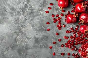 Poster - Fresh pomegranates arranged on a wooden table, perfect for food and nutrition concepts