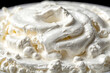 Close-Up View of white color Whipped Cream Texture on Black.