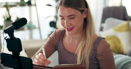 Canvas Print - Woman, influencer and recording with writing, notes and planning for episode of vlog in home living room. Girl, phone and microphone for live streaming with smile, notebook and ideas on social media