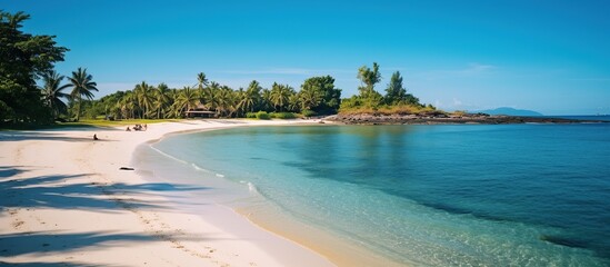 Poster - Sandy tropical beach with island on background