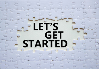 Wall Mural - lets get started symbol. concept words lets get started on white puzzle. beautiful white background.