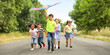 © Pixel-Shot - Little children flying kite outdoors