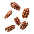 Pecan nuts falling over isolated white transparent background