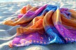 vibrant beach sarong fluttering in the sea breeze on sandy shore