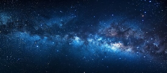 Wall Mural - an unobstructed sight of the breathtaking milky way and twinkling stars in the dark night sky