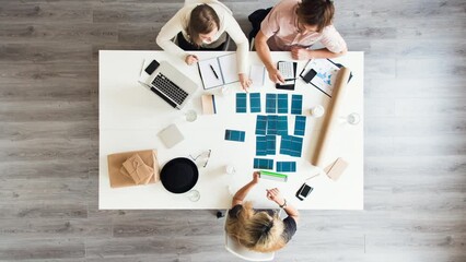 Aufkleber - Timelapse, business people and creative planning in workplace with collaboration, paperwork and technology. Graphic design, employees and brainstorming with top view for company meeting and teamwork