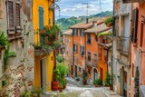 Fototapeta Fototapeta uliczki - A charming Italian village with narrow cobblestone streets and colorful houses