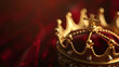 © tracy - A gold crown sits on a red background. The crown is ornate and has a cross on top. The red background adds a sense of royalty and grandeur to the image
