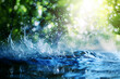A leaf touching the flowing water of a small stream, creating small splashes and ripples, with lush green plants and a clear sky in the background