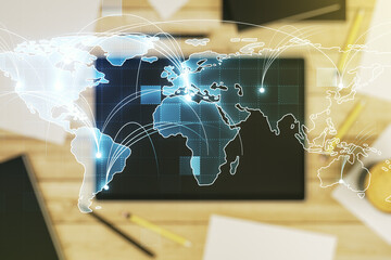 Aufkleber - Abstract graphic digital world map with connections and modern digital tablet on desktop on background, top view, globalization concept. Multiexposure