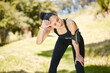 © peopleimages.com - Fitness, woman and rest in nature after running for cardio workout, marathon training or race. Sports, tired and female person wipe sweat in outdoor for fatigue, breathing or recovery from exercise