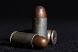 Fototapeta Konie - Close up of 11 mm. or .45 gun bullets , Full metal jacket ammunition