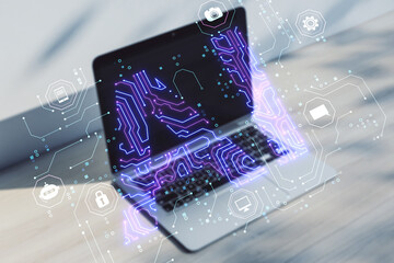 Canvas Print - Close up of laptop on light background with glowing blue AI hologram. Artificial intelligence, technology and innovation concept.