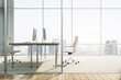Modern office interior with desks, chairs, glass partitions, and a cityscape view through large windows, conveying a professional workspace concept. 3D Rendering