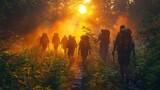 Fototapeta Tulipany - Group of Hikers Trekking Through Misty Forest at Sunrise