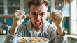 © 2rogan - Caucasian man displaying aggressive stance with fist in front of camera while holding a bowl of cereal