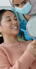 Poster - Healthcare, dentist and woman with mirror for consulting, oral hygiene and tooth examination. Dentistry, clinic and person with inspection at appointment for dental care, teeth whitening and advice