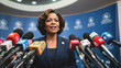 © CreativeMania - Afro American woman politician at press conference talking into microphones of mass media. Woman leader, political campaign and briefing concept