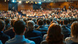 Rear view of Audience in the conference hall or seminar meeting which have Speakers