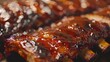 Close-up of glazed barbecue pork ribs glistening with caramelized sauce, inviting viewers to indulge.