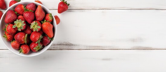 Poster - Fresh strawberries in a bowl on white surface