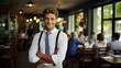 b'portrait of a young male waiter in a restaurant'