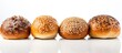 A row of seeded buns up close