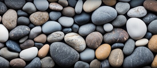 Canvas Print - Rough stony heap against dark backdrop