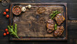 large wooden board with freshly grilled meat