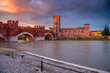 Verona, Italy. Cityscape image of beautiful Italian town Verona with the Castelvecchio Bridge over Adige River at sunrise.