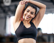 Stretching, exercise and portrait of girl in gym with healthy warm up to start workout with energy. Fitness, training or woman prepare body for wellness challenge and mobility practice for resilience
