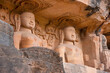 Jain sculptures carved along both the rock faces of the valley, popularly known as Rock - Cut Jain Images Urwai Gate or Siddhanchal group of caves, Fort complex, Gwalior, Madhya Pradesh, India