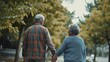 © Sasint - An elderly couple from different ethnicities holding hands while taking a walk, their faces telling a rich story of a life shared and cherished.