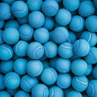 Fondo con detalle y textura de multitud de pelotas de tenis de color azul