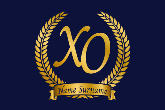 Initial letter X and O, XO monogram logo design with laurel wreath. Luxury golden calligraphy font.