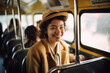 © Ievgen Skrypko - happy woman in bus, making passengers' commute enjoyable