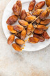 date branch dried sweet fruit fresh meal food snack on the table copy space food background rustic top view
