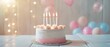 Happy birthday party celebration greeting card banner - Colorful birthday cake with many burning candles on wooden table, with balloons and confetti in the background