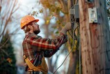 Fototapeta  - Electrician works on wiring a utility pole, showcasing skilled labor and attention to detail in a residential setting.
