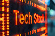 Investing in technology stock sector or fund concept, stock market display with word “Tech Stock” on digital background