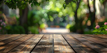 Wooden Deck Table With Blurred Green Courtyard Background, Green Courtyard Background With Empty Wooden Deck Table - Ai Generated