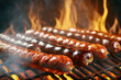 Grilled sausages on barbecue grill, close-up view with flames in background