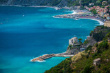Fototapeta Uliczki - 
Magic of the Cinque Terre. Timeless images. Monterosso, the port, the beach and the ancient village
