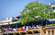 Huge number of colorful, multi-color cloths drying on the colorful ghats of Varanasi.